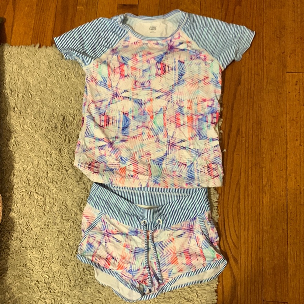 Athleta girl swim set top is L/12 bottoms M 8/10